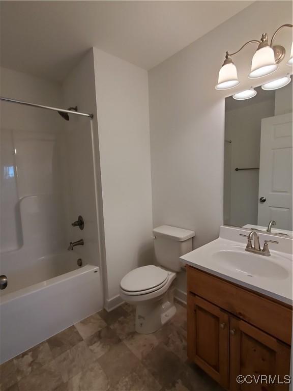 full bathroom with shower / tub combination, vanity, and toilet