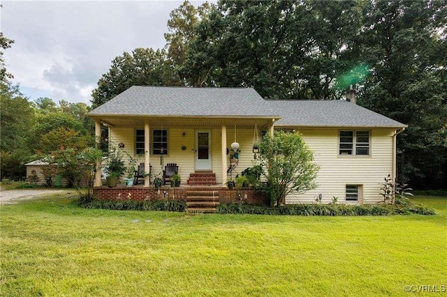 view of front of property with a front yard and a porch