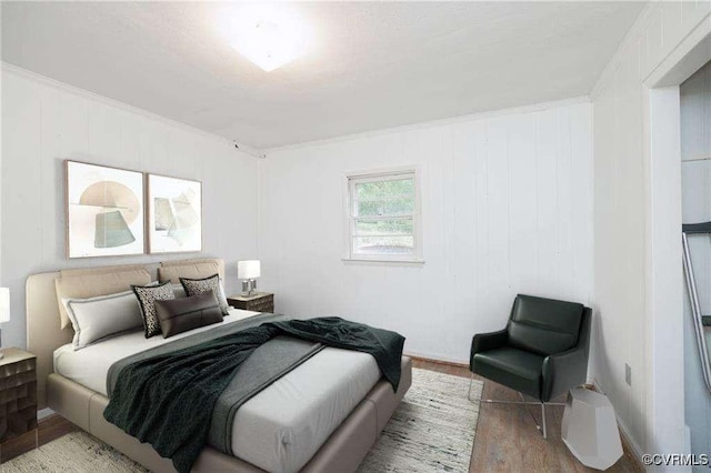 bedroom with light hardwood / wood-style floors