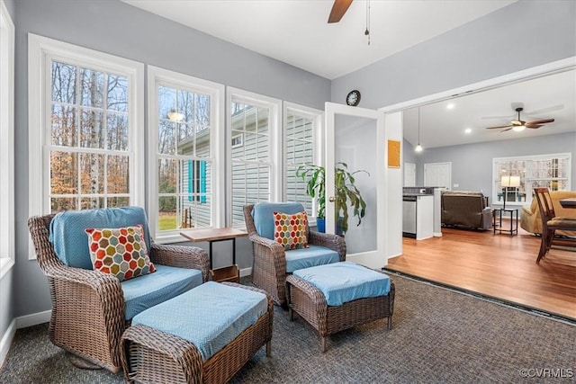 sunroom with ceiling fan