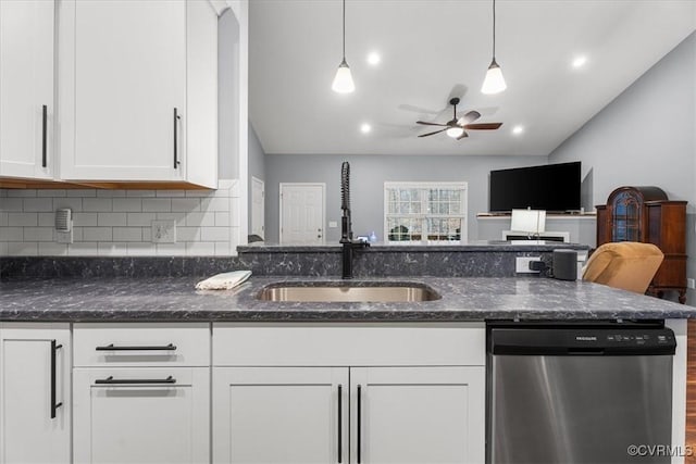 kitchen with white cabinetry, sink, pendant lighting, and stainless steel dishwasher