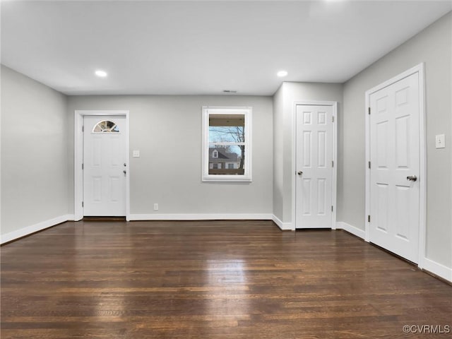 interior space with dark hardwood / wood-style floors