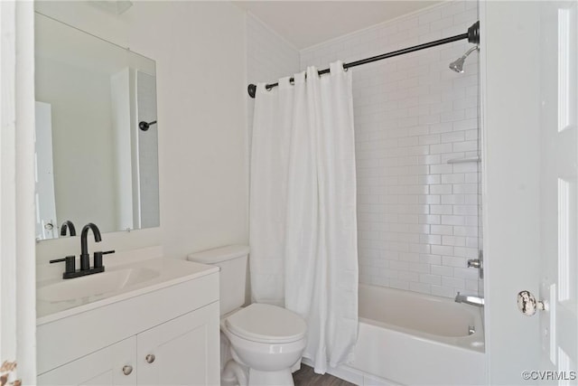 full bathroom featuring vanity, toilet, and shower / bath combo with shower curtain