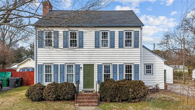 colonial house with a front yard