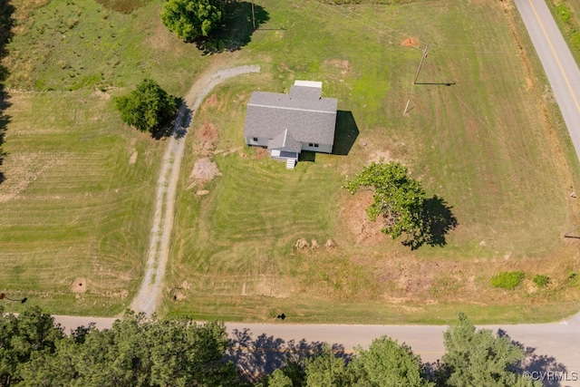 birds eye view of property featuring a rural view