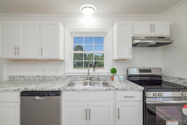 kitchen featuring sink, appliances with stainless steel finishes, light stone counters, ornamental molding, and white cabinets