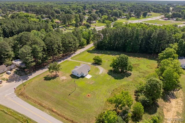 birds eye view of property featuring a rural view