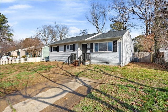 single story home featuring a front lawn