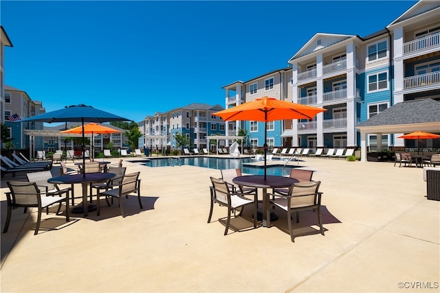 view of swimming pool featuring a patio