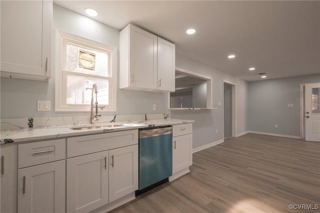 kitchen featuring sink, dishwasher, dark hardwood / wood-style floors, light stone counters, and white cabinets