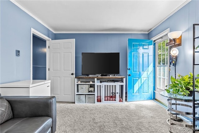 carpeted living room with ornamental molding