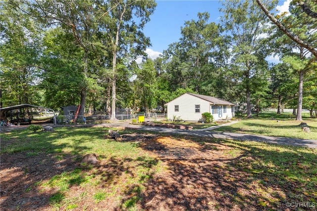 view of yard featuring a carport