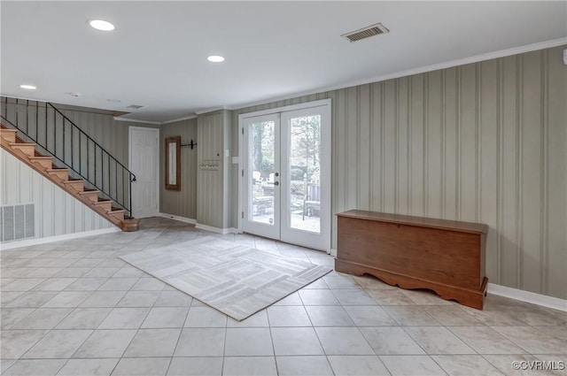 doorway to outside featuring stairs, french doors, visible vents, and baseboards