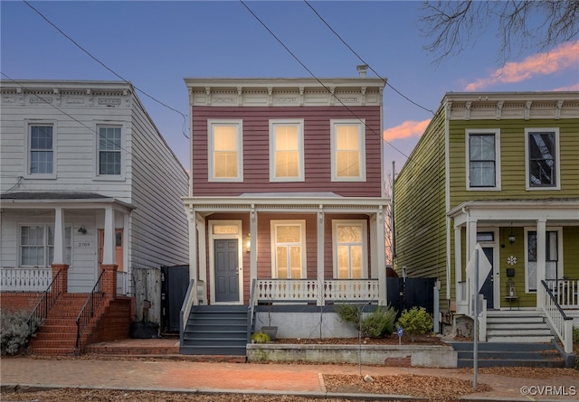 italianate house featuring a porch