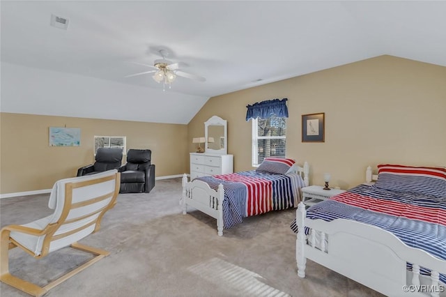 carpeted bedroom featuring lofted ceiling and ceiling fan