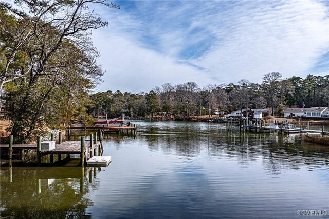 view of dock with a water view