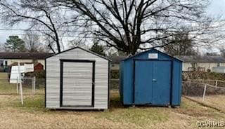 view of outbuilding with a lawn