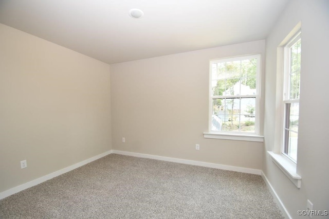 view of carpeted spare room