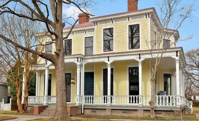 italianate-style house with a porch