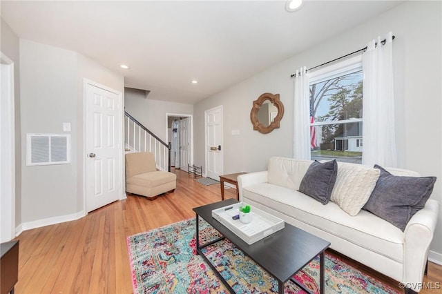 living room with hardwood / wood-style flooring