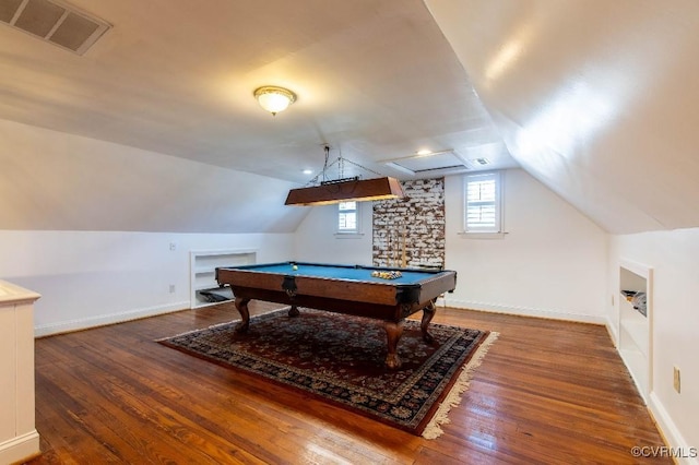 rec room with hardwood / wood-style flooring, vaulted ceiling, and billiards