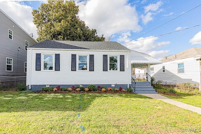 view of front of property with a front lawn