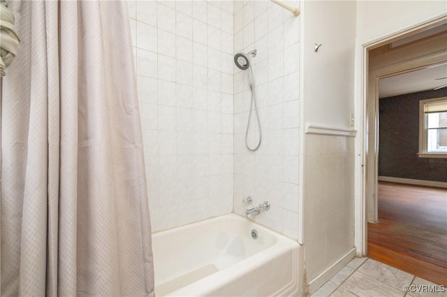 bathroom with shower / tub combo