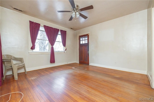 foyer featuring ceiling fan and wood-type flooring