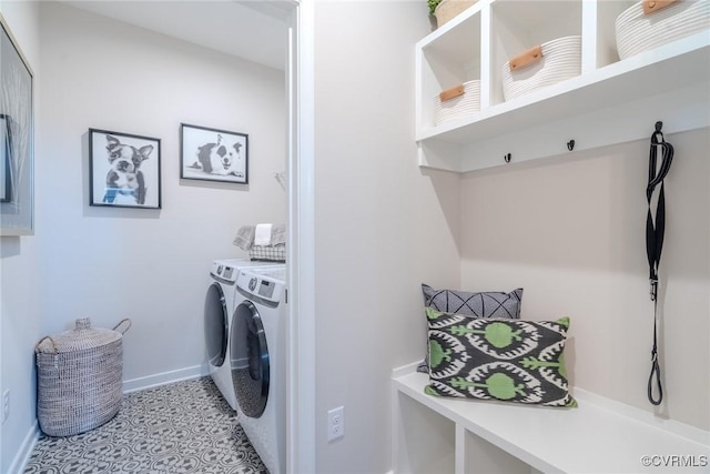 laundry area with washing machine and dryer