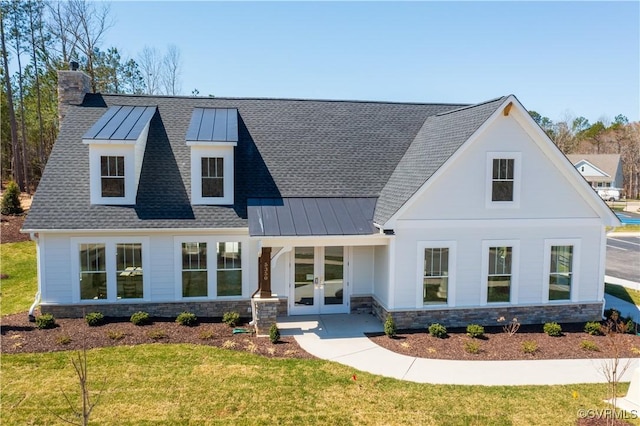 0 Canoe Pointe Loop, Moseley, VA 23120 - modern farmhouse with french doors, a chimney, a standing seam roof, stone siding, and a shingled roof