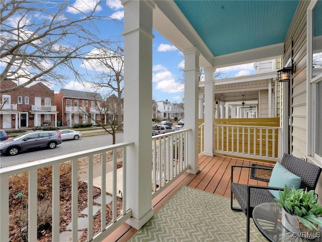 balcony featuring a porch