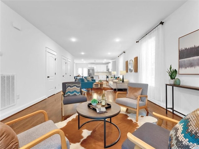 living room featuring hardwood / wood-style flooring