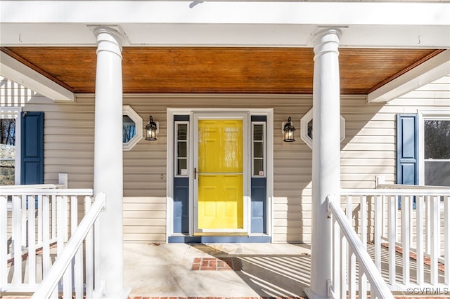 doorway to property with covered porch