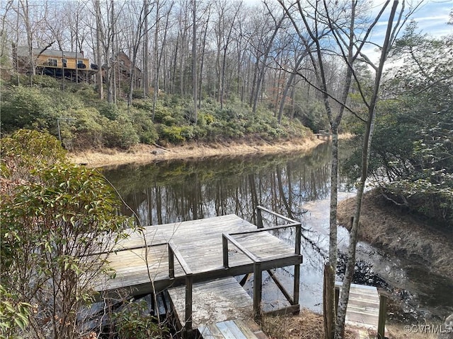 view of dock featuring a water view