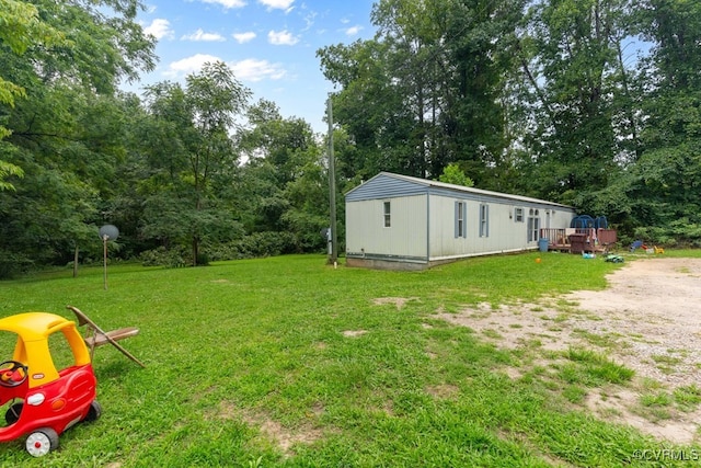 view of yard featuring a deck