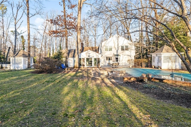 view of yard with a patio and a fenced in pool