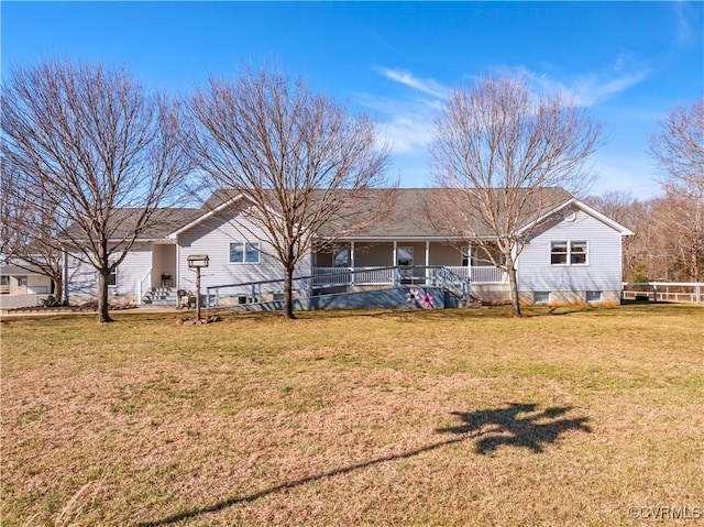 view of front of house with a porch and a front yard