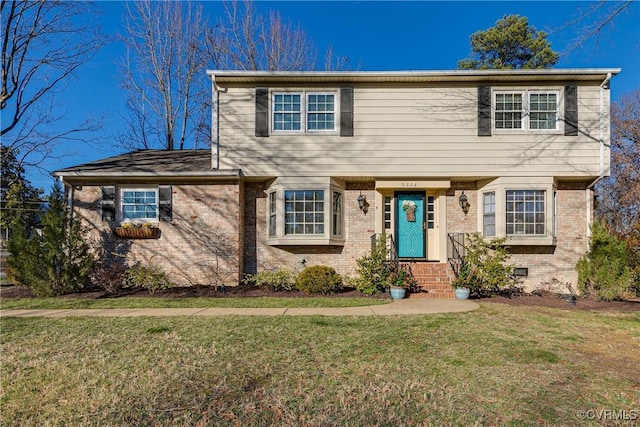 view of front of home with a front yard