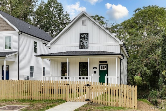 modern inspired farmhouse featuring covered porch