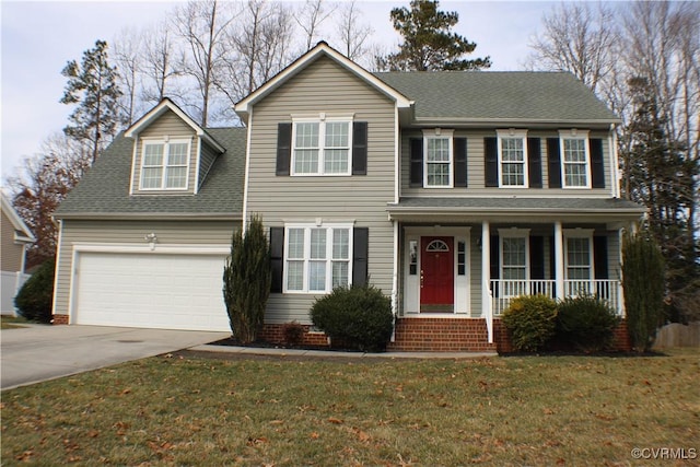 colonial-style house with a garage and a front yard