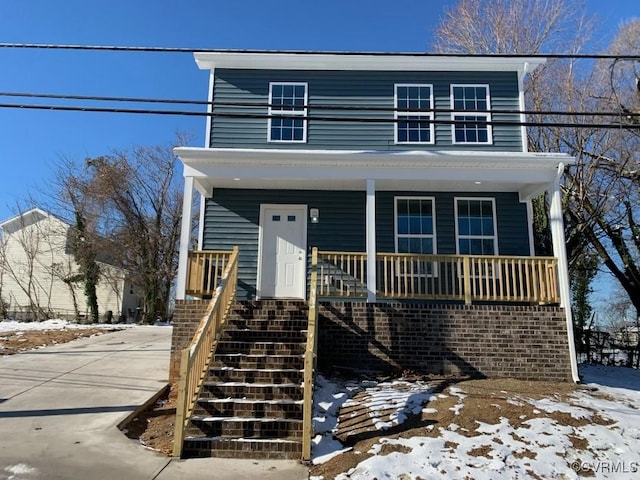 view of property with a porch