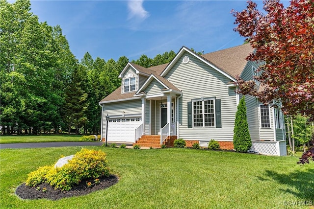 view of front of home featuring a garage and a front lawn