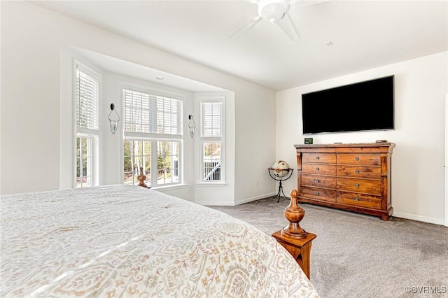 bedroom with light carpet and ceiling fan