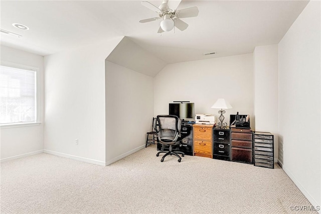 carpeted office featuring ceiling fan