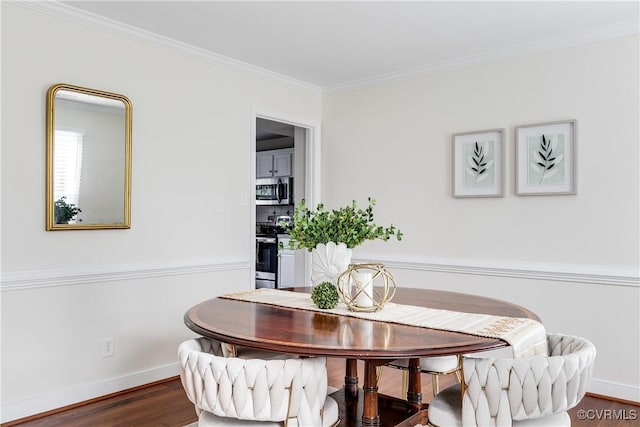 dining room with crown molding, baseboards, and dark wood-style flooring