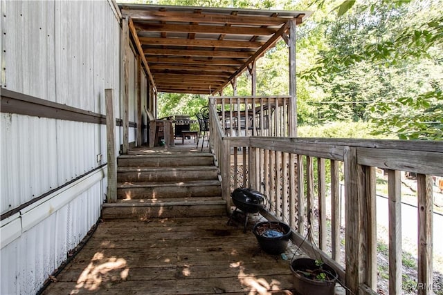 wooden terrace featuring area for grilling