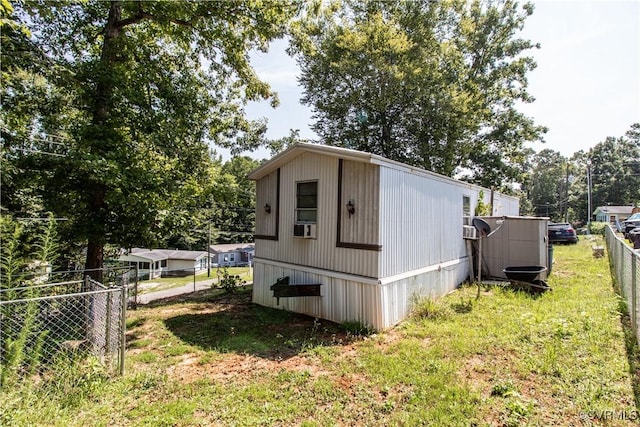 view of outbuilding featuring a yard