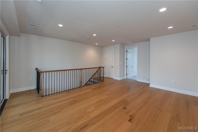 empty room featuring light hardwood / wood-style floors