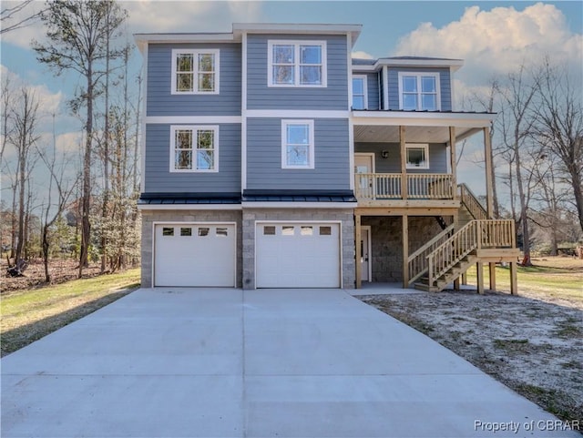 view of front of property featuring a garage and covered porch