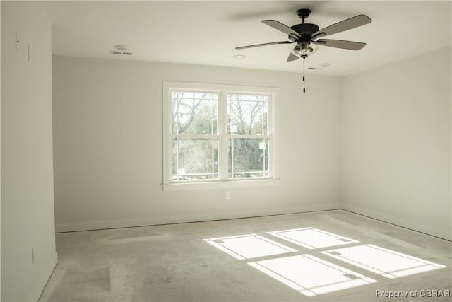 empty room featuring ceiling fan